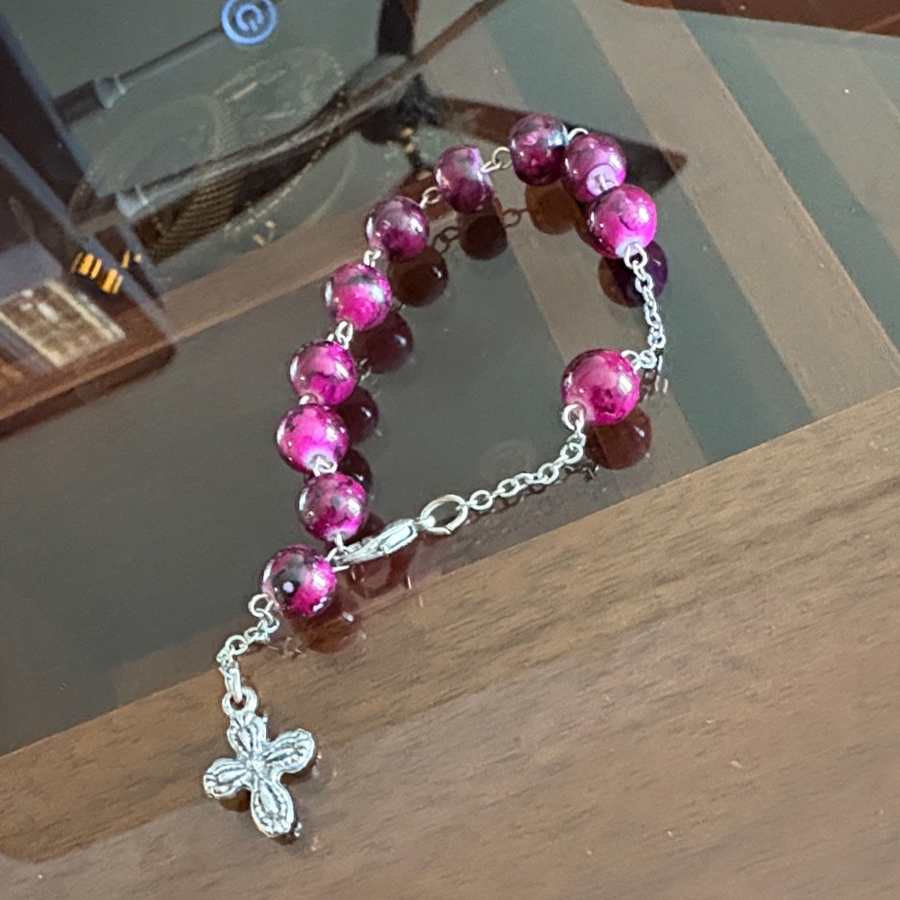 Chic Fuchsia Beaded Bracelet with Silver Cross Charm bought at the Vatican City